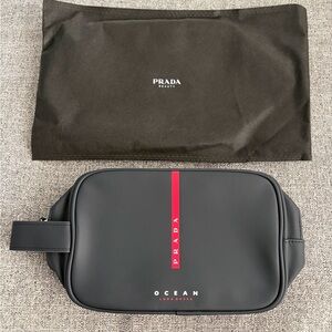 New Prada Black Men’s Toiletry Bag with Red Center Stripe and side handle 9x3.5”